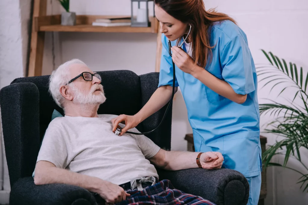 nurse with stethoscope checking heart rate of seni 2022 11 02 04 16 23 utc